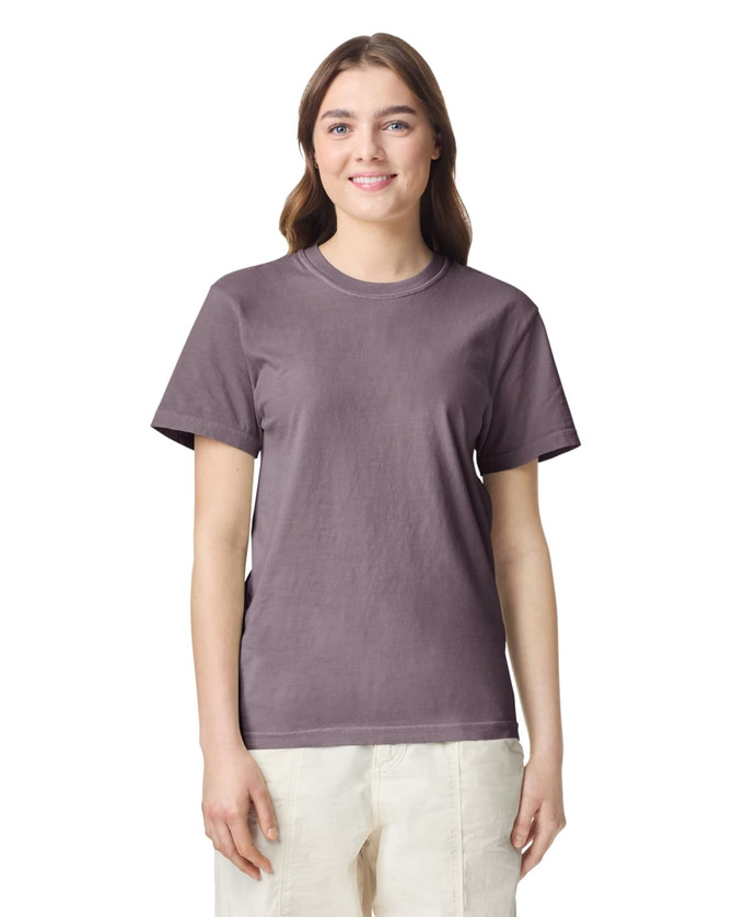 A lavender heavyweight t-shirt for adults, featuring a classic crew neck and short sleeves, with a logo on the side.