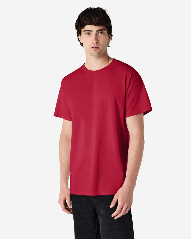 A red Gildan Ultra Cotton adult t-shirt displayed on a model, featuring short sleeves and a round neck.