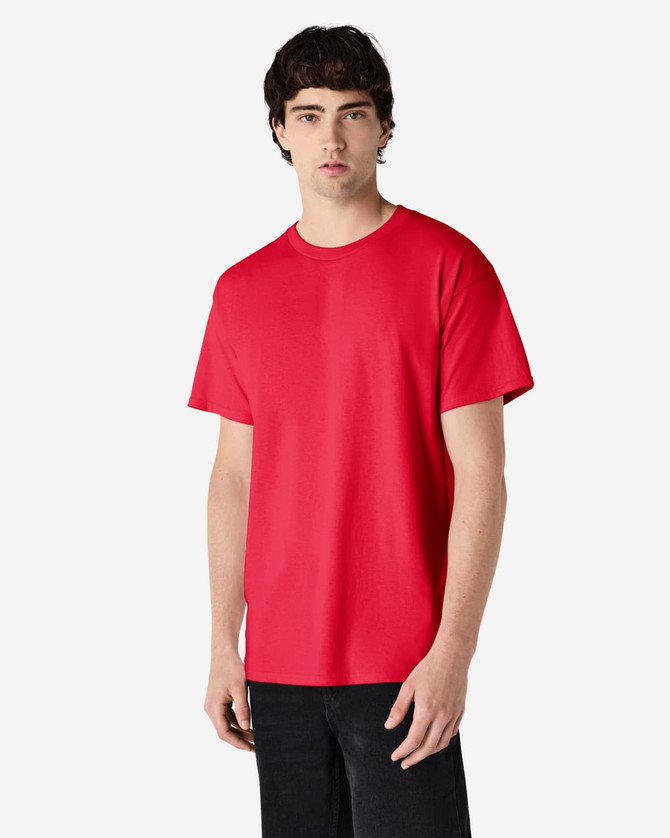 A red Gildan Ultra Cotton adult T-shirt displayed on a model, featuring a simple design and a standard fit.