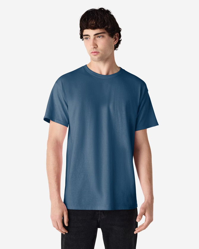 A blue Gildan Ultra Cotton adult T-shirt displayed on a male model, featuring a logo.