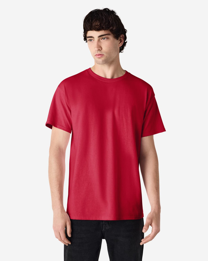 A red Gildan Ultra Cotton adult T-shirt on a model, featuring a basic crew neck and short sleeves.