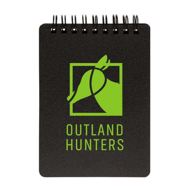A spiral-bound pocket notebook featuring a black cover and a green logo with the text "OUTLAND HUNTERS."