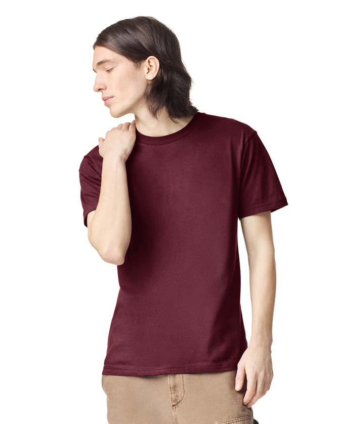 A maroon unisex short sleeve t-shirt with a crew neck, featuring a logo on the upper left chest.
