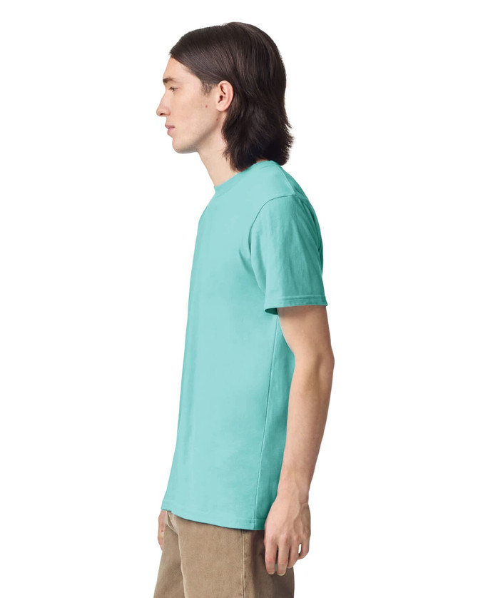 A unisex fine jersey short sleeve t-shirt in a vibrant turquoise colour, displayed from the side.