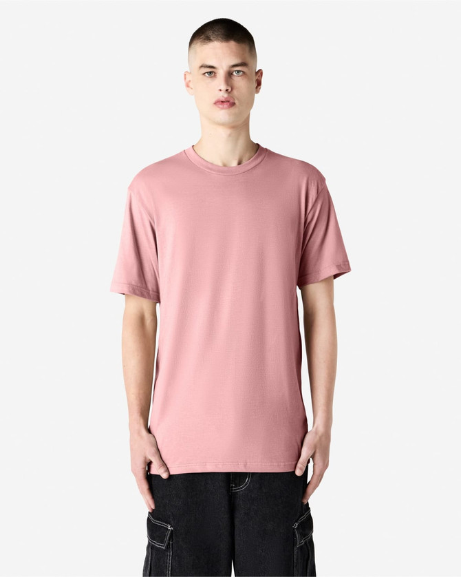 A unisex CVC short sleeve t-shirt in a soft pink colour, featuring a simple design and a logo.