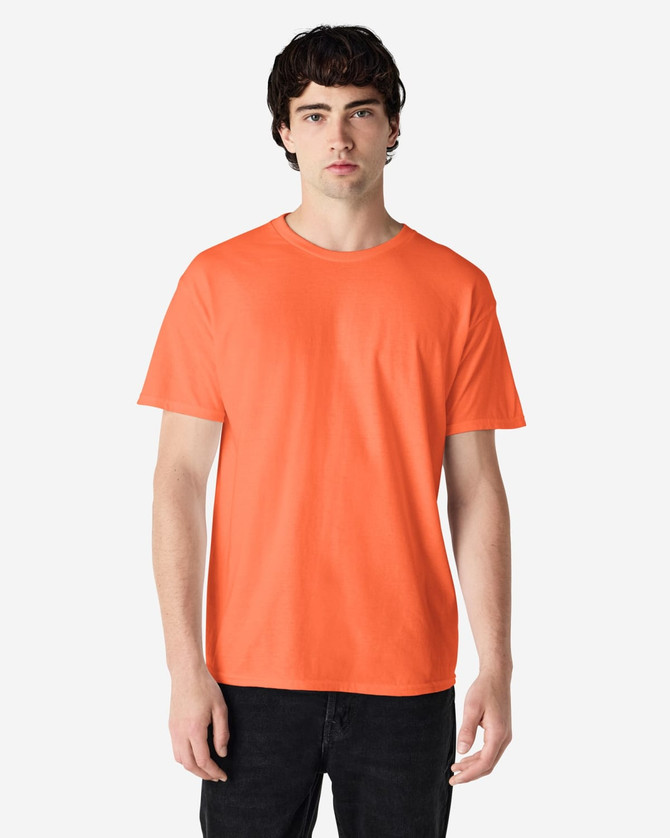 An orange Gildan Heavy Cotton adult T-shirt displayed on a male model against a plain background.