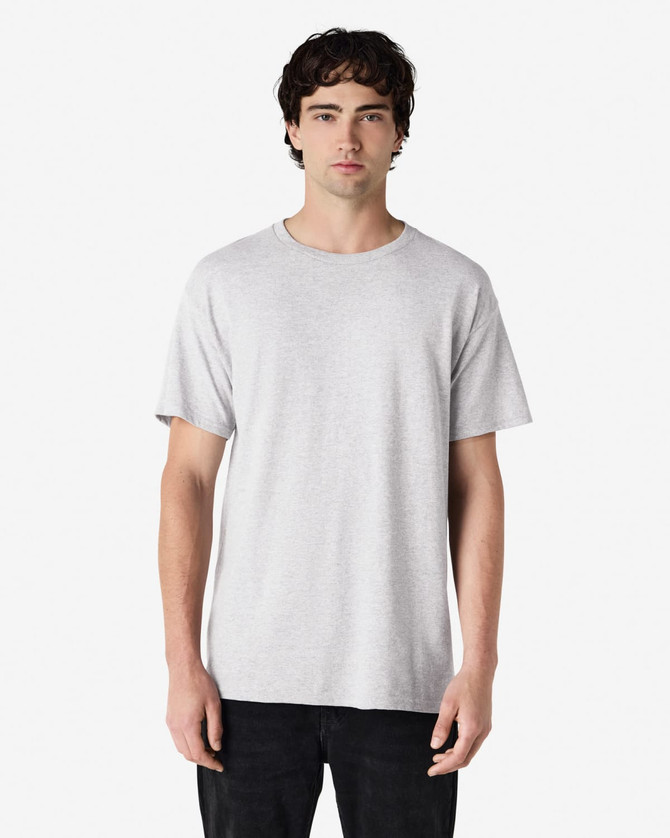 A grey Gildan Heavy Cotton adult T-shirt is displayed, featuring a simple design and short sleeves.