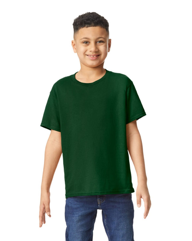 A green youth T-shirt is displayed on a smiling child, paired with denim jeans. The shirt has a logo.