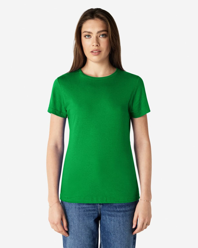 A green Gildan Softstyle ladies' T-shirt displayed on a model, featuring a classic crew neck and short sleeves.