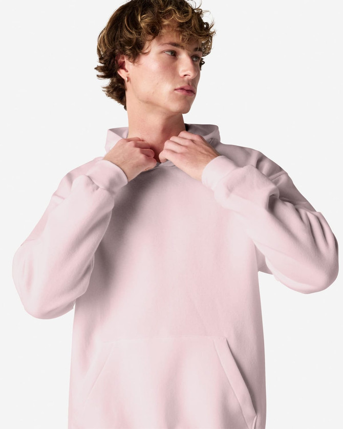 A unisex hooded sweatshirt in soft pink, featuring a front pocket and a branding logo.