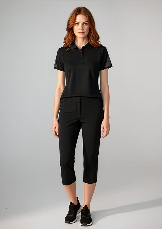 A women's black short sleeve polo shirt displayed with matching black pants, featuring a logo on the polo.