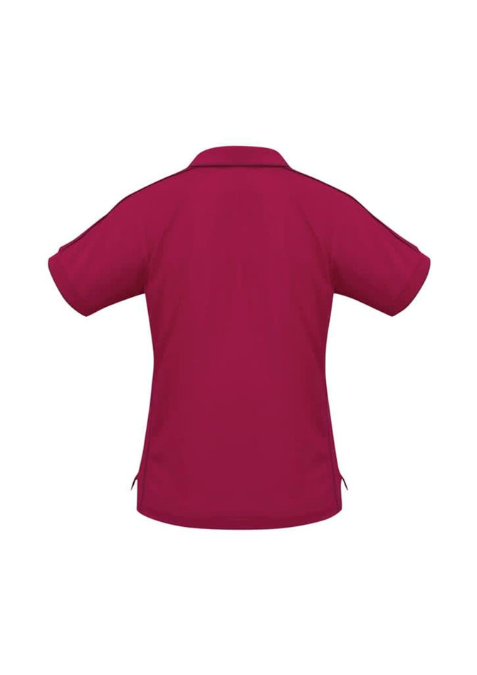 A burgundy women's polo shirt with a short sleeve design and a collar, featuring a logo.