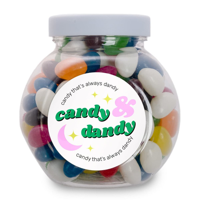 A glass jar filled with assorted colored mini jelly beans, featuring a label that says "candy that's always dandy."