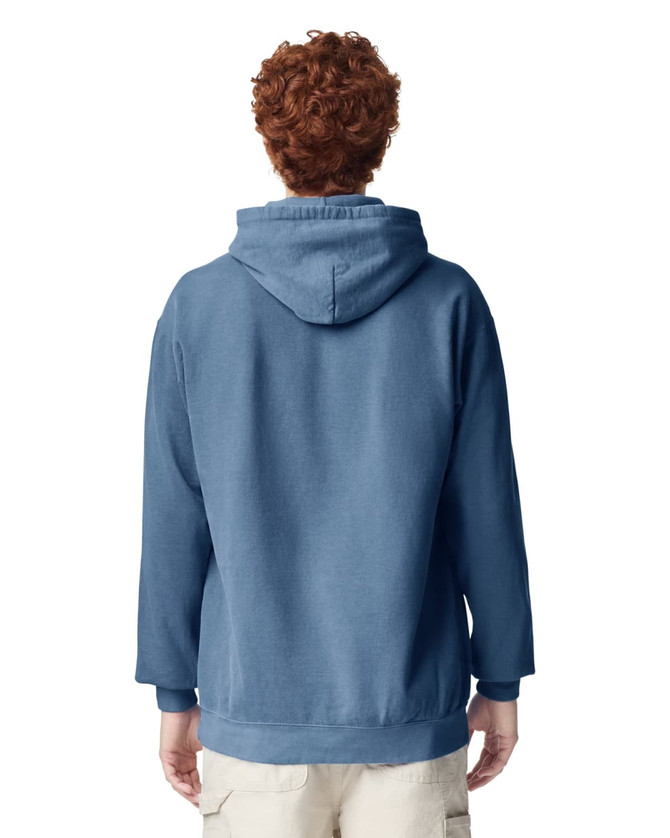 A blue adult hooded sweatshirt featuring a spacious hood and a relaxed fit, with an unseen logo.