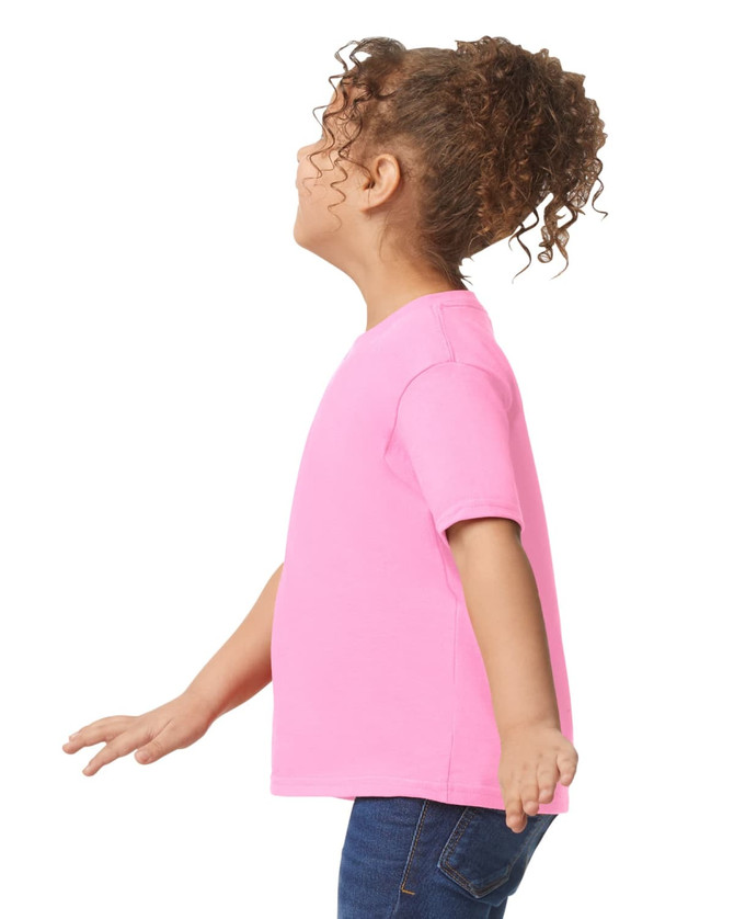 A toddler t-shirt in bright pink with short sleeves, featuring a logo on the side.