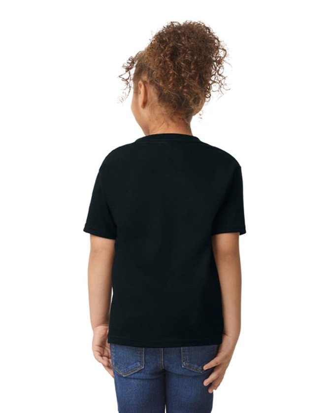 A black toddler t-shirt is displayed, viewed from the back, worn by a child with curly hair.