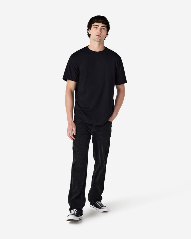 A black Gildan Hammer adult T-shirt displayed on a model, paired with black pants and shoes.