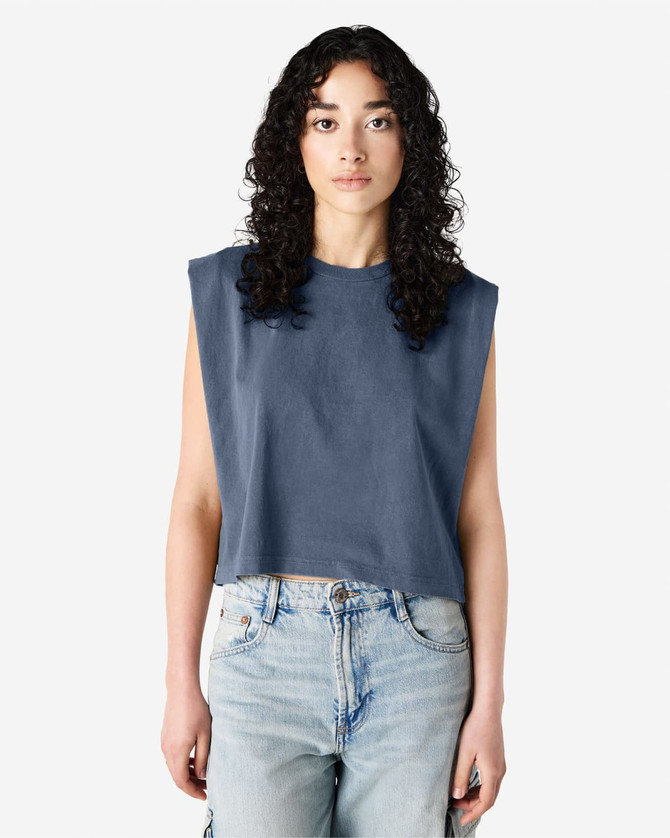 A navy blue women's muscle t-shirt with wide sleeves, displayed on a model, featuring a branded logo.
