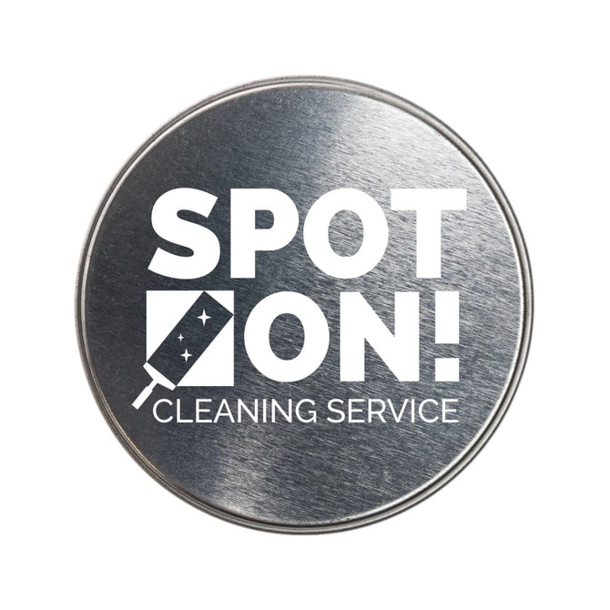 A silver round tin with a logo for "Spot On! Cleaning Service."