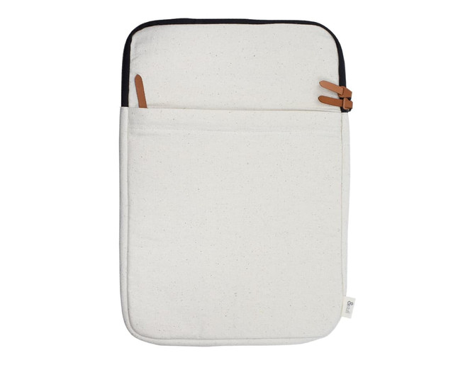 A laptop sleeve in cream with a black trim, featuring two leather straps and a front pocket.