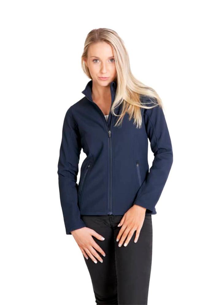 A navy women's soft shell jacket with a zip closure and pockets, modelled by a woman with long hair.