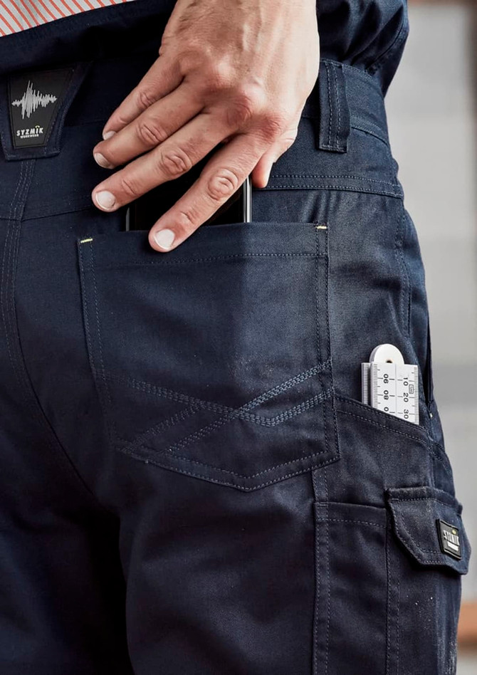 Navy cargo pants featuring multiple pockets, including a phone holder and a pocket for tools. Includes a branding logo.