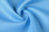 A lightweight, smooth fabric in a light blue shade with a subtle sheen, featuring a swirling texture.