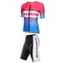 A cycling jersey in pink and blue gradient with short sleeves, paired with black shorts featuring white detailing and a logo.