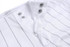 A white baseball uniform featuring a zippered neck and subtle pinstripes, with buttons and a logo.