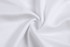 A swirl of smooth, white fabric, showcasing a clean and simple texture ideal for sports uniforms.