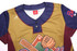 A gold and navy baseball tee featuring two buttons, with a logo on the sleeve.