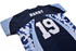 A dark blue and light blue camouflage jersey with the name "HARRY" and the number "19" on the back.