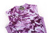 A purple camouflage sleeveless jersey with a zip and textured panel, featuring a logo.