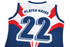 A women's singlet in navy blue, red, and white, featuring a large number '22' and branding.