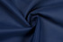 A close-up of navy blue cotton fabric with a smooth texture, showcasing its soft lining.