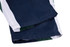 A sports uniform featuring dark navy blue and white colours, with green detailing and a logo.