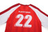A red and white soccer jersey featuring a number 22 on the back and a logo on the chest.