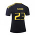 A black shirt with yellow detailing and a logo, featuring the number 23 on the back.