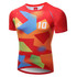 A red football jersey featuring a colourful abstract design with geometric shapes and a logo on the front.