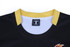 A black rugby top with yellow accents at the collar and a logo on the front. Features a tag indicating size 'M'.
