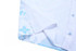 A white school wear shirt featuring a blue patterned design and button details.