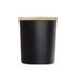 A large black glass candle with a smooth finish and a bamboo lid. Minimalistic design with a sleek appearance.