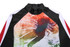 A colourful sublimation rashie club tee featuring an abstract design in orange, red, and black with a high neckline.