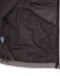 An inside view of a men's softshell high-tech jacket featuring a mesh pocket, predominantly grey in colour.