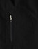 A black men's softshell jacket featuring a zipped pocket. The fabric appears smooth and high-tech. 
