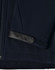 A navy softshell jacket featuring a sleek design with a leather patch on the sleeve. Includes a logo.