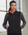 A softshell vest in black and grey with an orange lining and zipper, featuring a logo and pockets.