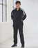 A black track jacket with white accents, featuring a zip front and side pockets, modelled by a young boy.