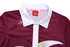 A maroon women's polo shirt featuring a white collar and a logo on the chest.