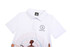 A white polo shirt featuring a patterned design and a logo on the chest.